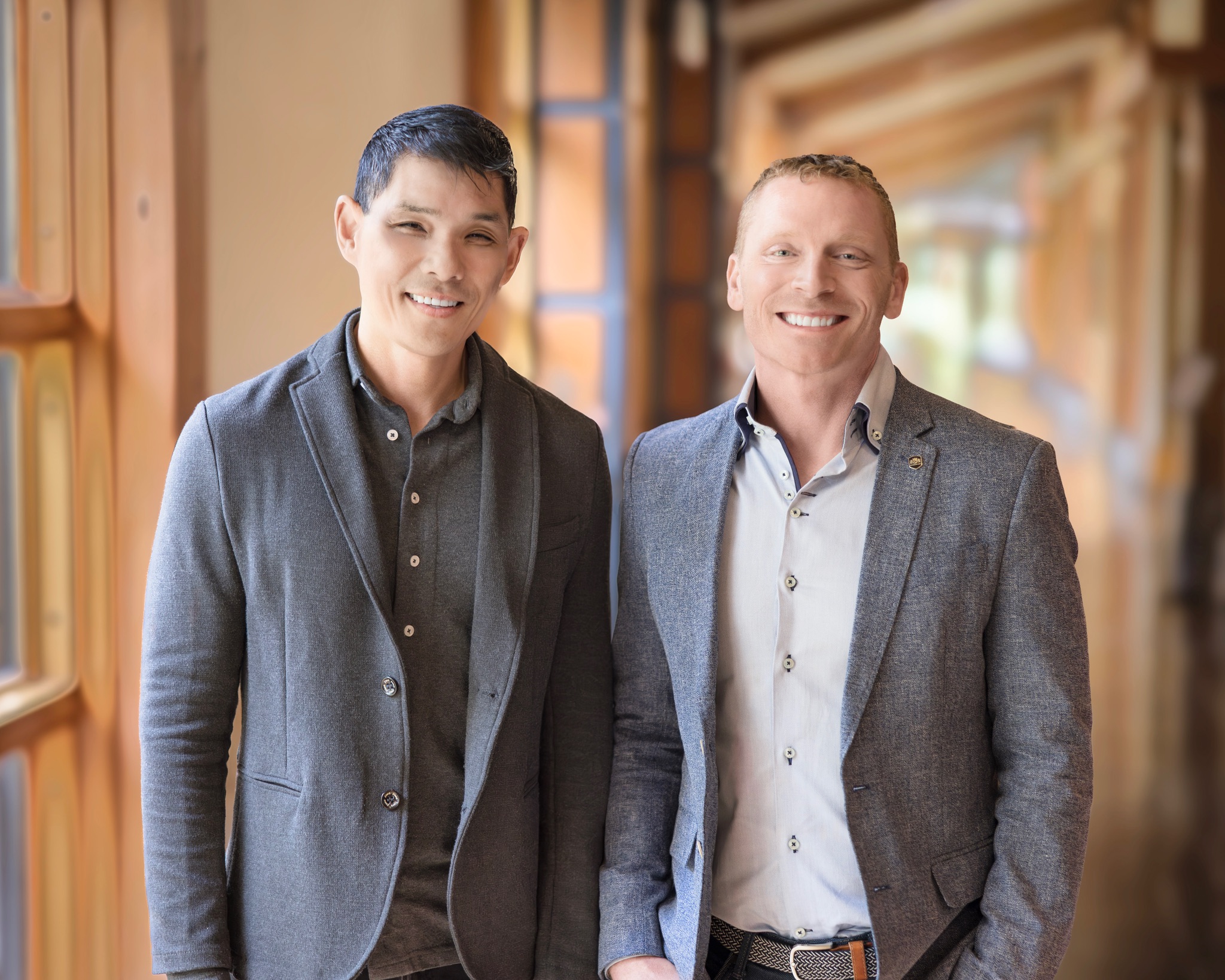 Founders of the Gay Couples Institute smiling together